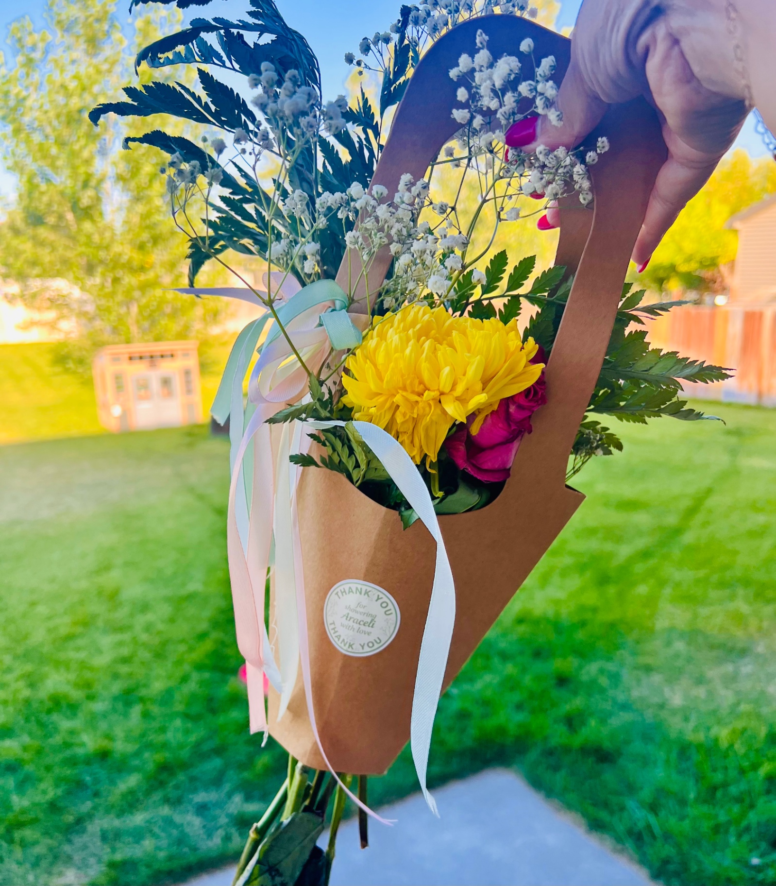 Finished Bloom Bar bouquet with ribbons and thank-you sticker